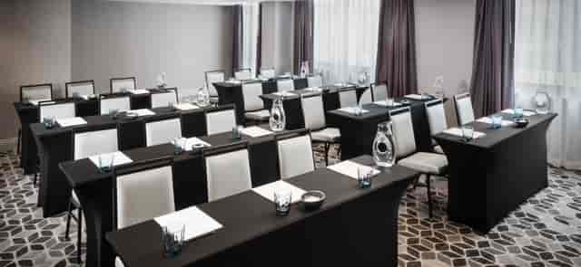 Whitman Room at The Darcy, modern meeting space for professional conferences and workshops.