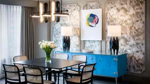 Wylie Room at The Darcy: modern event space with elegant lighting and floral decor.
