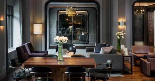 Stylish event space at The Darcy with plush seating for networking and meetings.