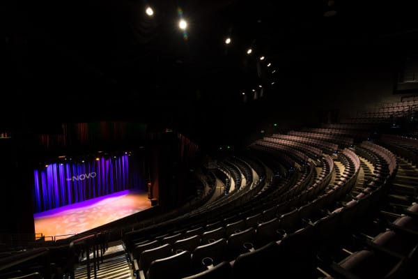 The Novo stage with elegant lighting, perfect for corporate events and performances.