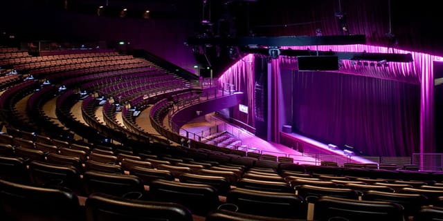 The Novo theater at Crypto.com Arena with vibrant purple lighting, ideal for events.
