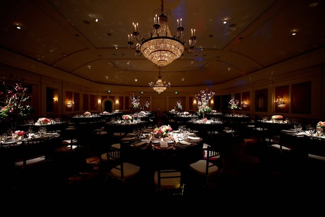 Elegant banquet hall with chandelier at River Oaks Country Club for weddings and events.
