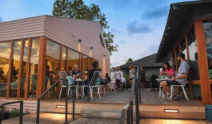 "Modern outdoor Art Space at Heights Mercantile for casual meetings and social events."