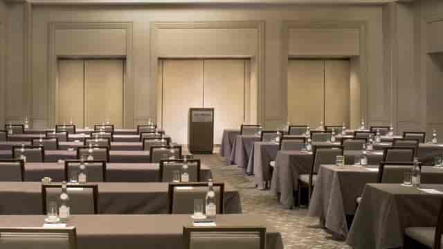 Corporate meeting room setup in DC with organized tables for seminars and workshops.