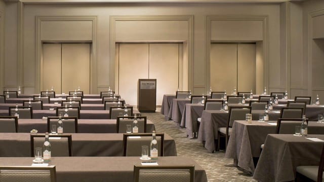 Corporate meeting room setup in DC with organized tables for seminars and workshops.