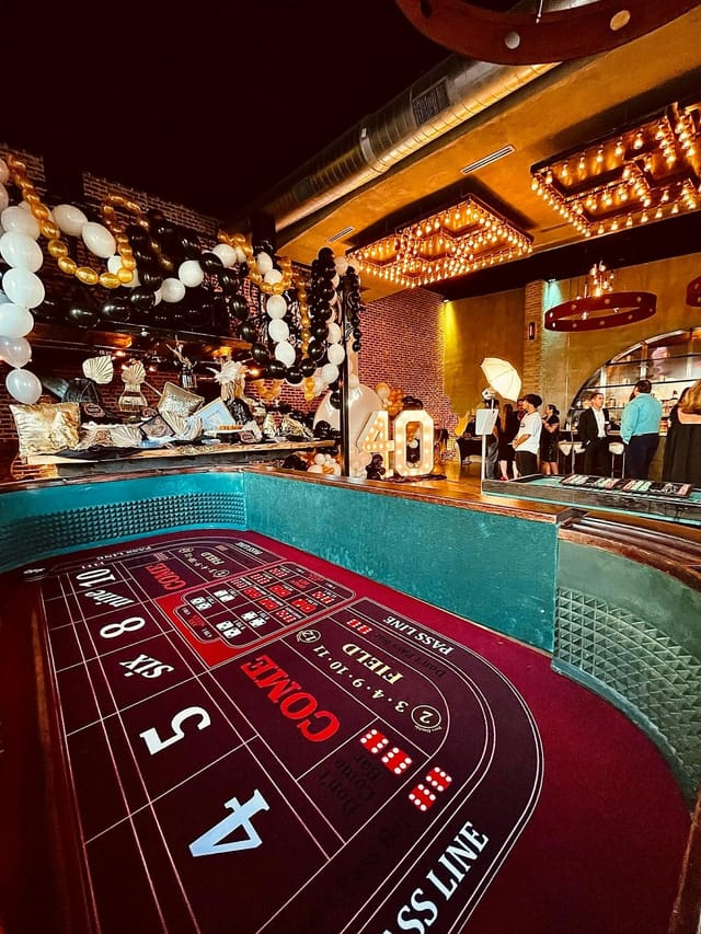 Casino-themed party room with plush seating for milestone celebrations.