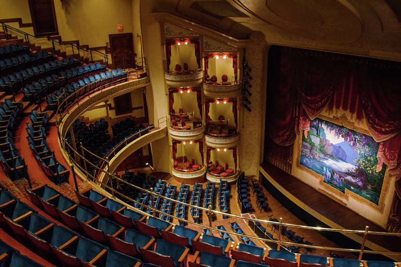 Lambert Hall theater with ornate stage, perfect for elegant events and performances.