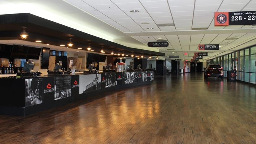 Club Level Concourse in Minute Maid Park, featuring polished wooden floors for events.