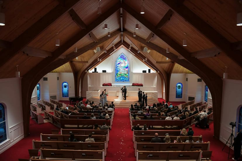 Elegant Ballroom at Brookwood Community with stained glass, ideal for weddings and events.