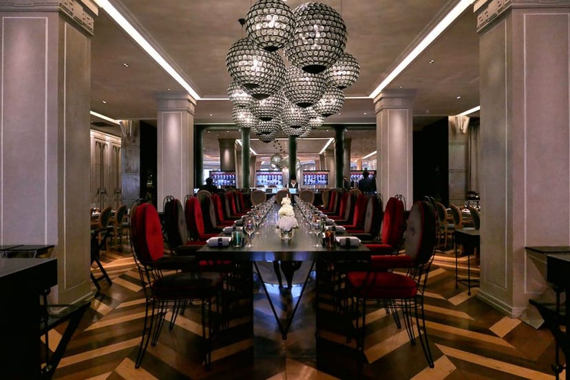 Sophisticated event space with elegant table setup for corporate meetings in Bund 18.