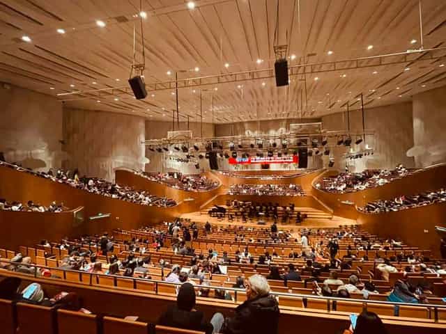 Shanghai Oriental Art Center auditorium with tiered seating for concerts and exhibitions.