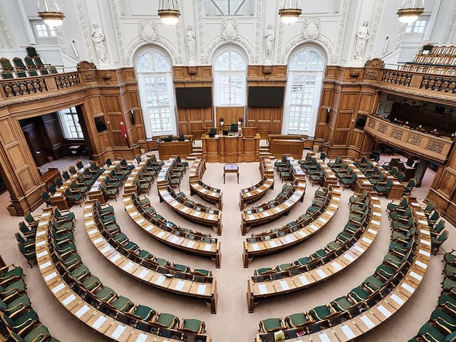 Main Hall of Danish Institute, tiered seating for large meetings and formal events.
