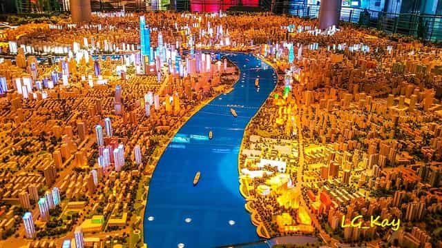 Exhibition Hall model showcasing illuminated Shanghai skyline for events and logistics.
