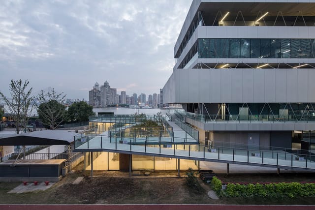 Modern Art Museum Shanghai event space with waterfront view for versatile gatherings.