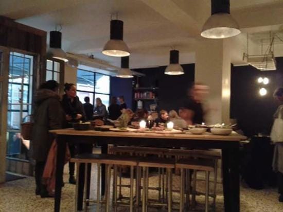 Function Room in Sidecar: vibrant restaurant for networking events with communal seating.
