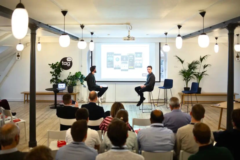 Event management company in Copenhagen hosting a panel discussion with engaging speakers.