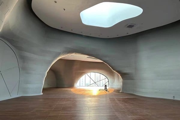 Small event space with organic design and natural light for creative workshops.