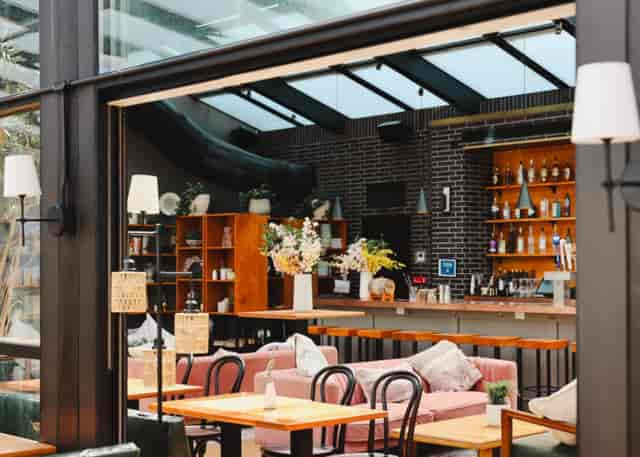 Modern Glass Ceiling venue with natural light, ideal for events and meetings.