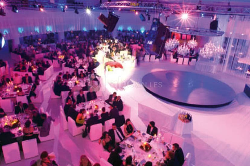 Elegant gala at Palais des Festivals with modern design and ambient lighting.