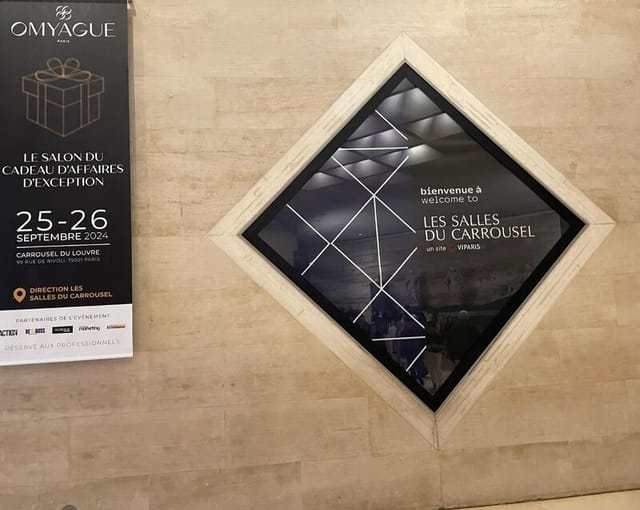 Stylish event entrance at Salon Omyague for upcoming trade show in Paris.