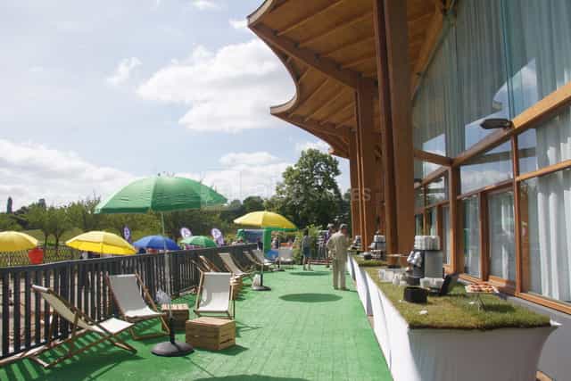 Pavilions at Parc Floral, inviting outdoor event space with wooden structure and summer atmosphere.