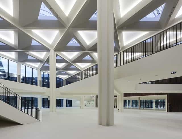 Modern convention center with geometric architecture, ideal for corporate events and meetings.