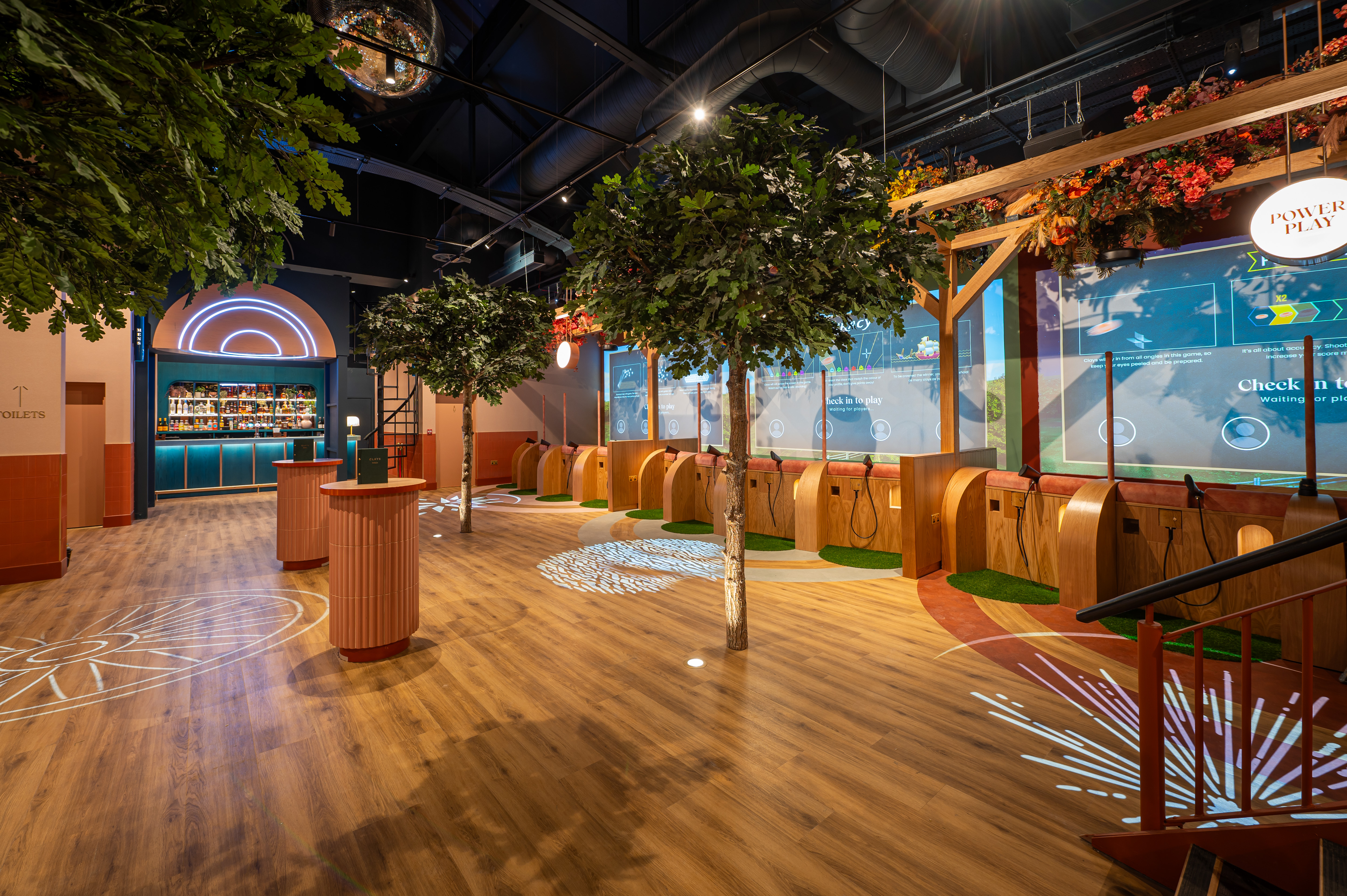Vibrant Clays Arcade in Birmingham, ideal for networking and creative events. - Banner