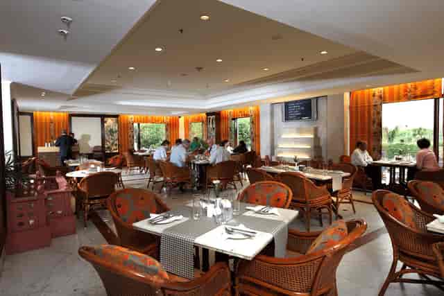 Elegant dining space in The Ashok, perfect for corporate meetings and networking events.