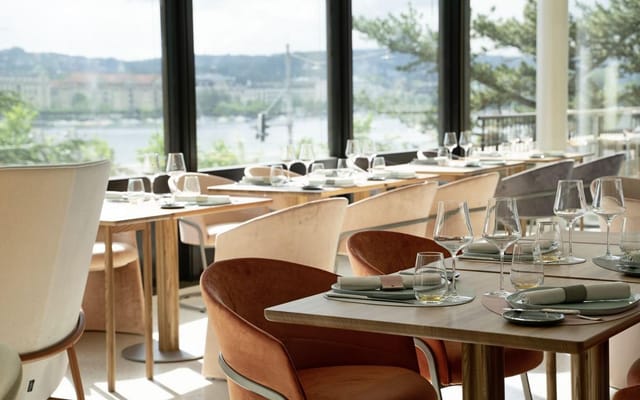 Elegant dining space at LUX Restaurant & Bar for corporate events and private dinners.