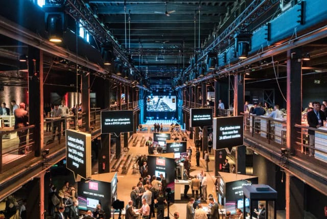Main Hall at Motorwerk Berlin, showcasing modern industrial design for events and networking.