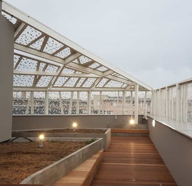 Cresco Auditorium rooftop space, glass-enclosed, ideal for networking events and gatherings.