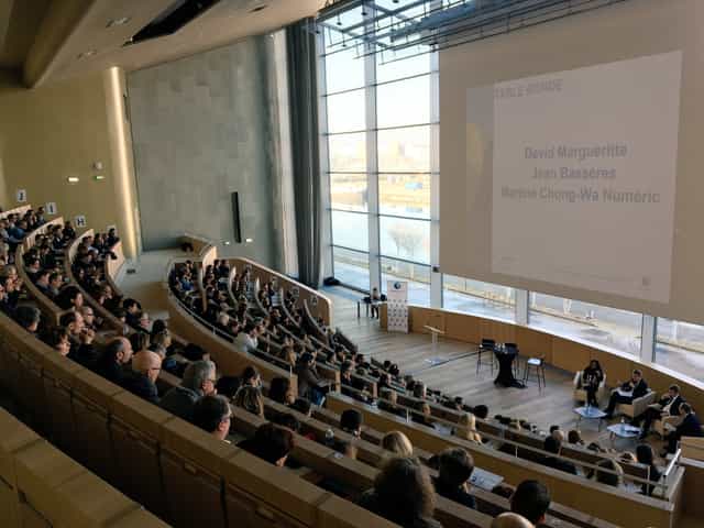 Auditorium at Carré des Docks, Le Havre: spacious conference venue with natural light.
