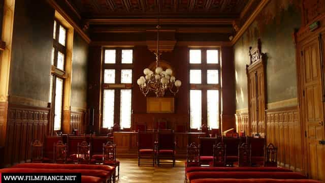 Elegant historic meeting space with wood paneling, ideal for conferences or private events.