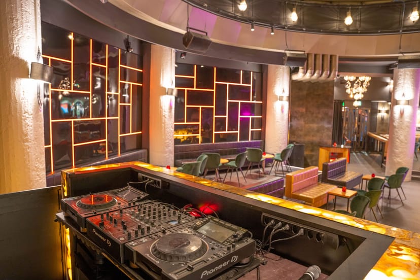 Vibrant urban restaurant event space with stylish furniture for cocktail receptions.