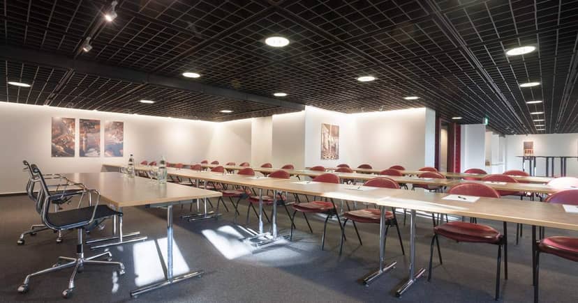 Seminar Room Venezia in EMA House: modular tables perfect for corporate events and training.