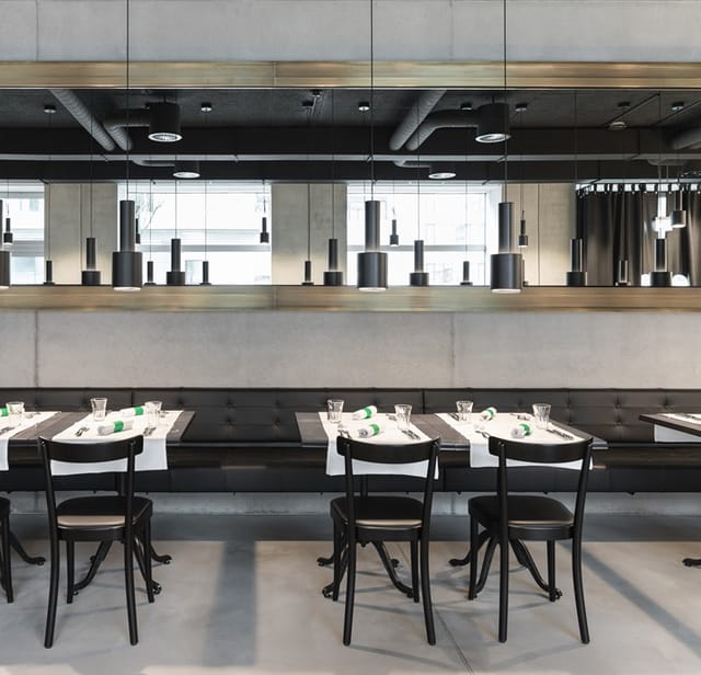 Modern bar at Placid Hotel Zurich, ideal for business meetings and events.