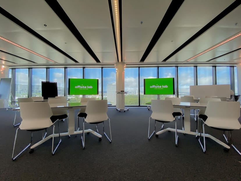 Modern function room with flexible seating for meetings and workshops at Offsite Lab.