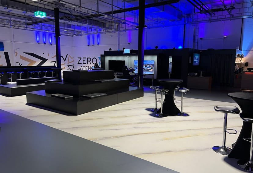 VR Lounge XL in VR City: sleek minimalist design for corporate events and product launches.