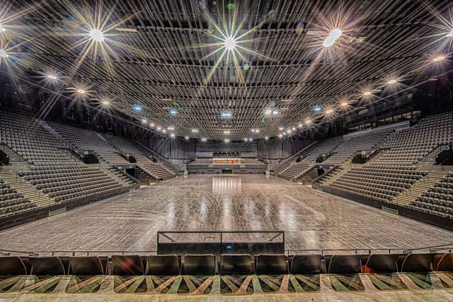 "Spacious Auditorium St. Jakobshalle Basel with tiered seating for concerts and conferences."
