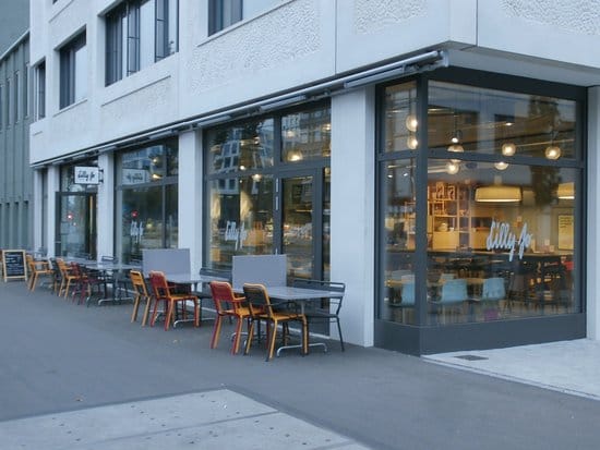 Modern Lilly Jo café with large windows, perfect for casual meetings and events.