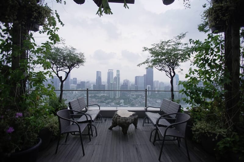Stylish Terrarium Rooftop terrace with city skyline for sophisticated outdoor events.
