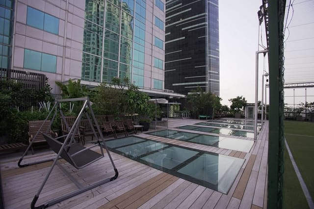 Calathea Terrace rooftop with glass floor, perfect for networking events and gatherings.