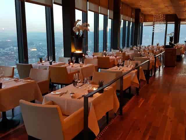 Sophisticated function room with panoramic city views, ideal for upscale events and receptions.
