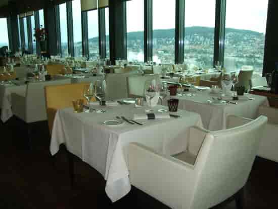 Elegant CLOUDS Kitchen setup for upscale meetings and private events with panoramic views.