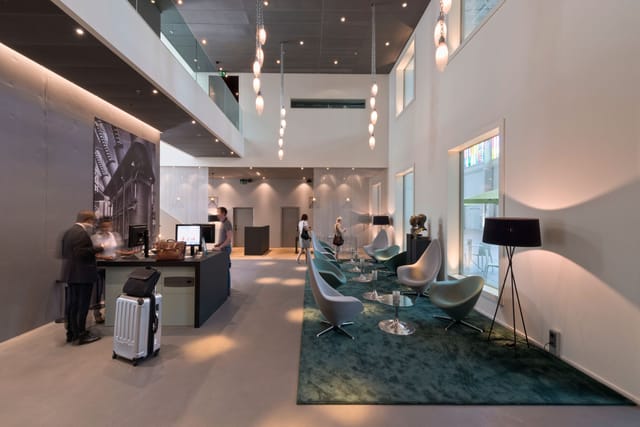 Trafo Hall Foyer: modern lobby with stylish seating for events and networking.