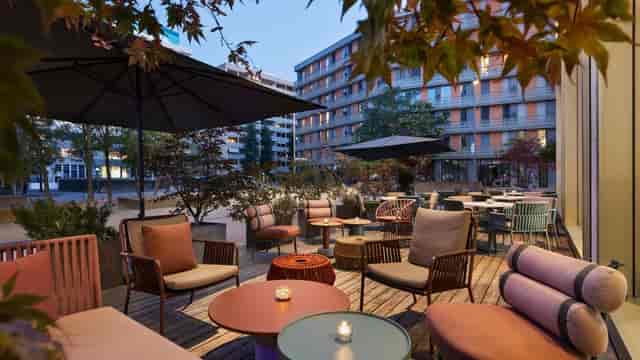 Stylish outdoor terrace at Renaissance Zurich for networking events and meetings.