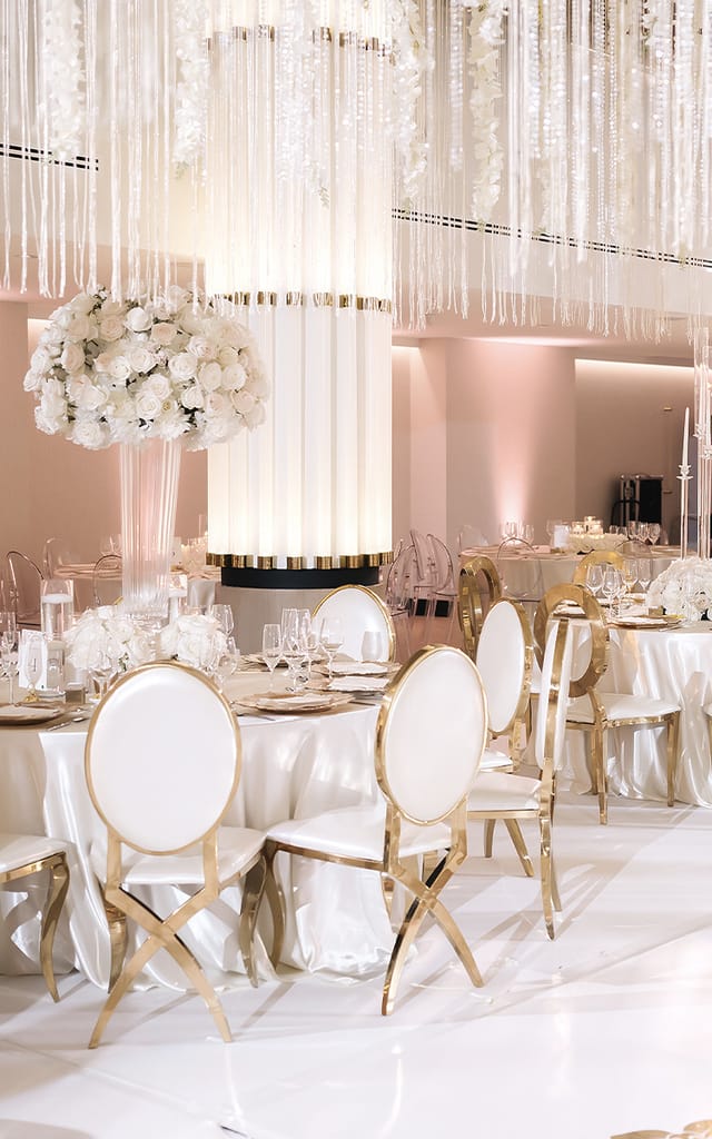 Elegant Schuyler Breakout Rooms with floral centerpieces, ideal for upscale weddings and events.