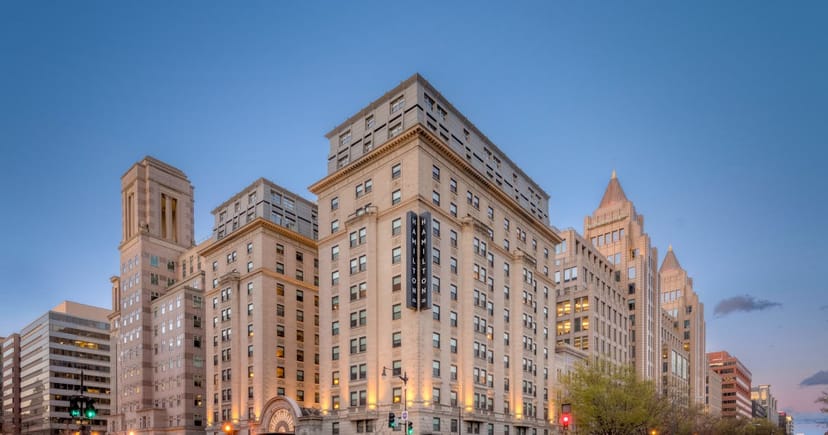 Historic Schuyler in Hamilton Hotel with elegant facade, ideal for corporate events.