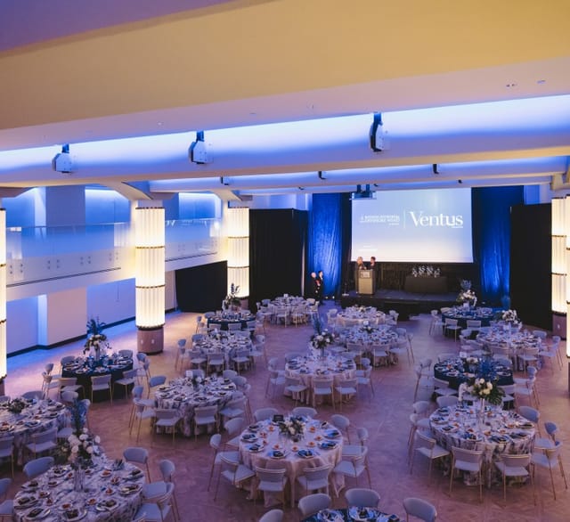 Hamilton Ballroom set for formal event with elegant lighting and floral centerpieces.