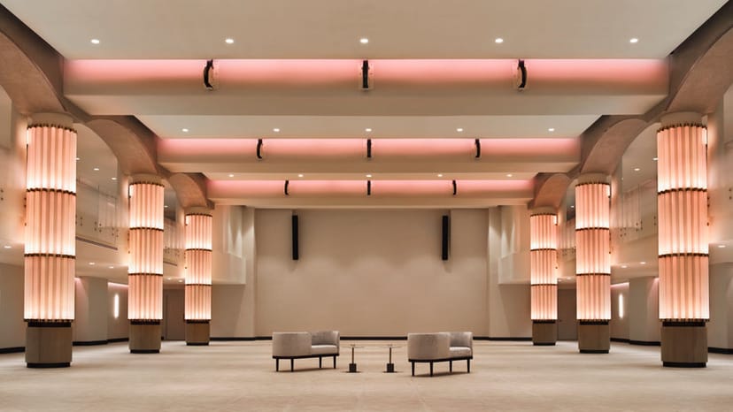 Hamilton Ballroom at Hamilton Hotel: Elegant event space with glowing column lighting.